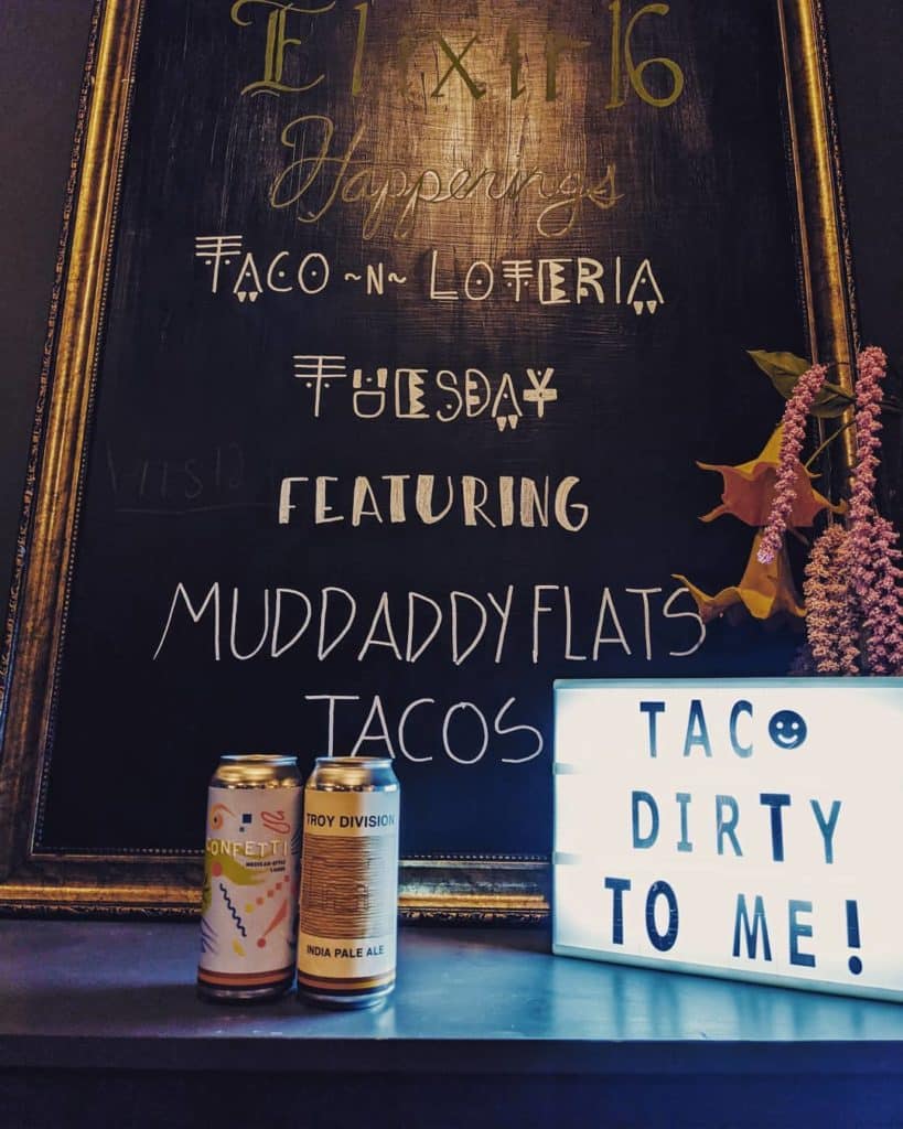 We’re hanging at @elixir16troy tonight munching on @muddaddyflats tacos and downing …